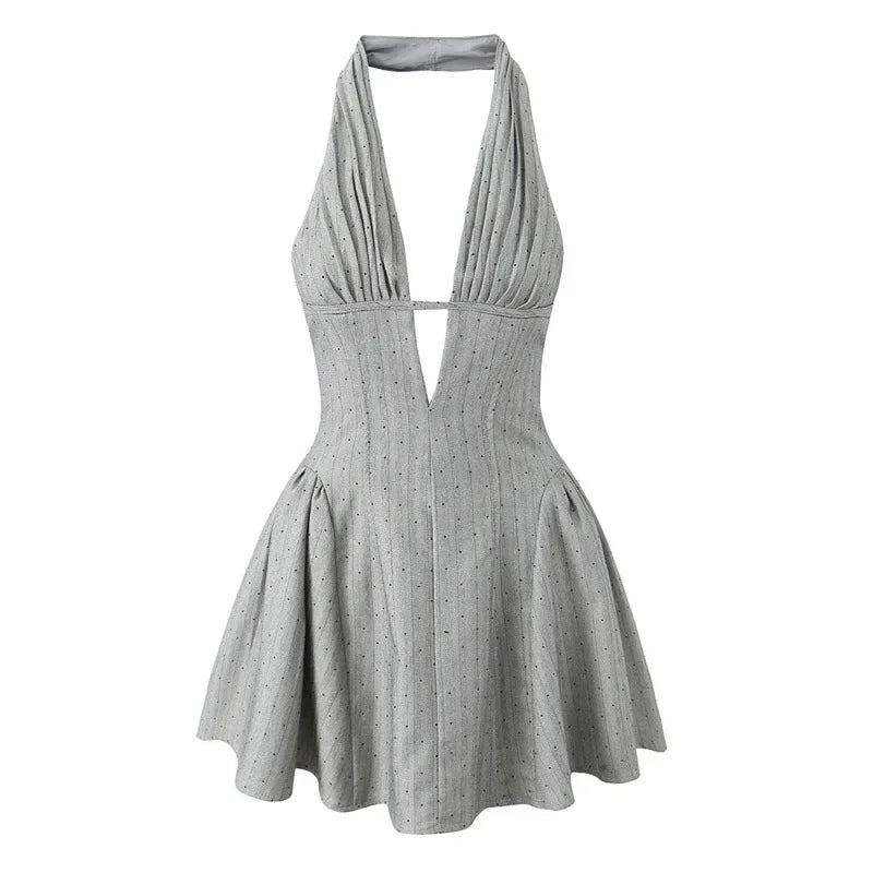 Gray halter neck mini dress with tie-back straps – back view on mannequin.