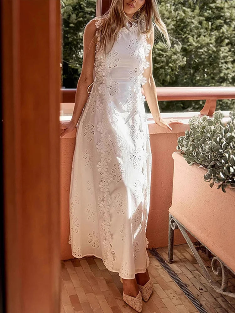 Elegant summer midi dress with white floral details and A-line silhouette