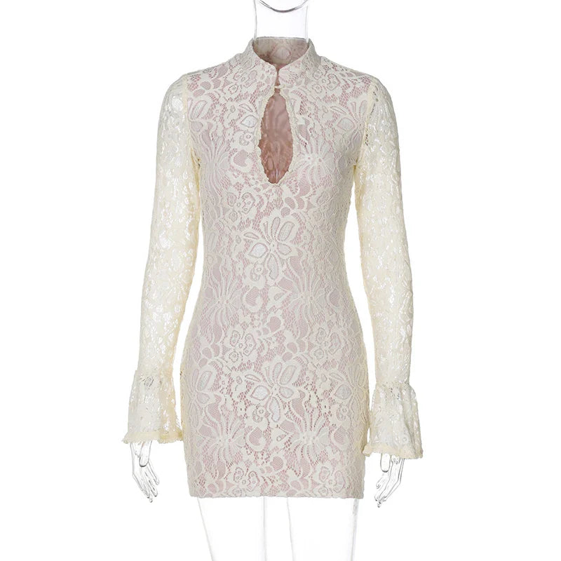 White lace dress on a mannequin against a white background