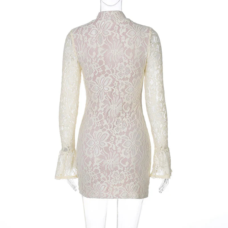White lace dress on a mannequin against a white background