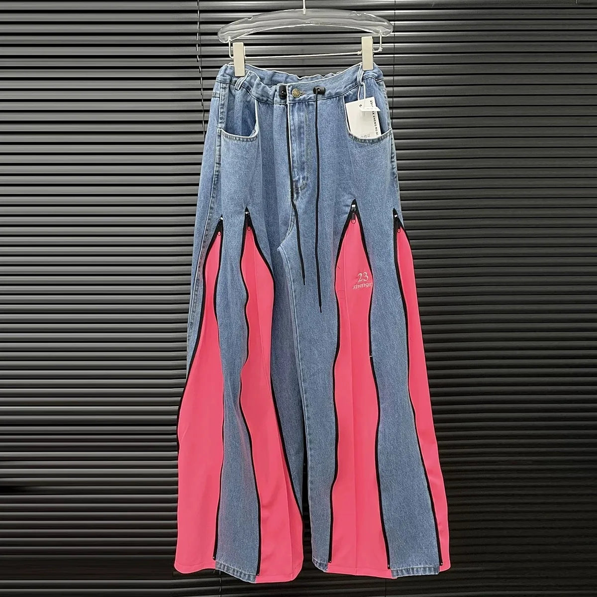 Y2K style denim pants with color block pink and zipper detail