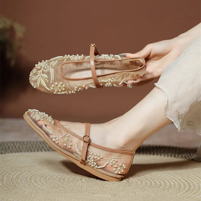 Apricot embroidered Mary Jane flats with floral lace and breathable mesh design.