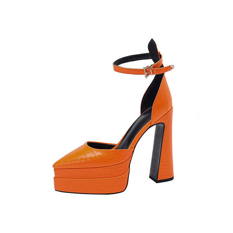 A vibrant orange croc effect pointed toe platform chunky heel pump with an ankle strap and buckle closure.