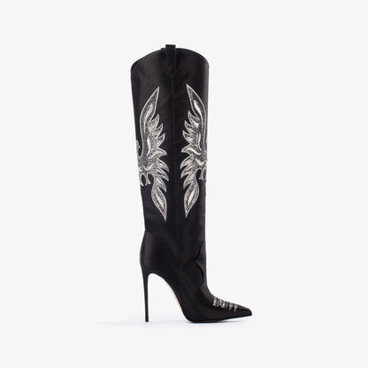 Black knee-high boot with silver feather embroidery on a white background