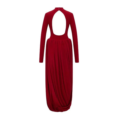 Red dress with long sleeves and cut-out design on a white background