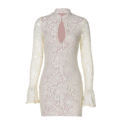 White lace dress with long sleeves on a white background