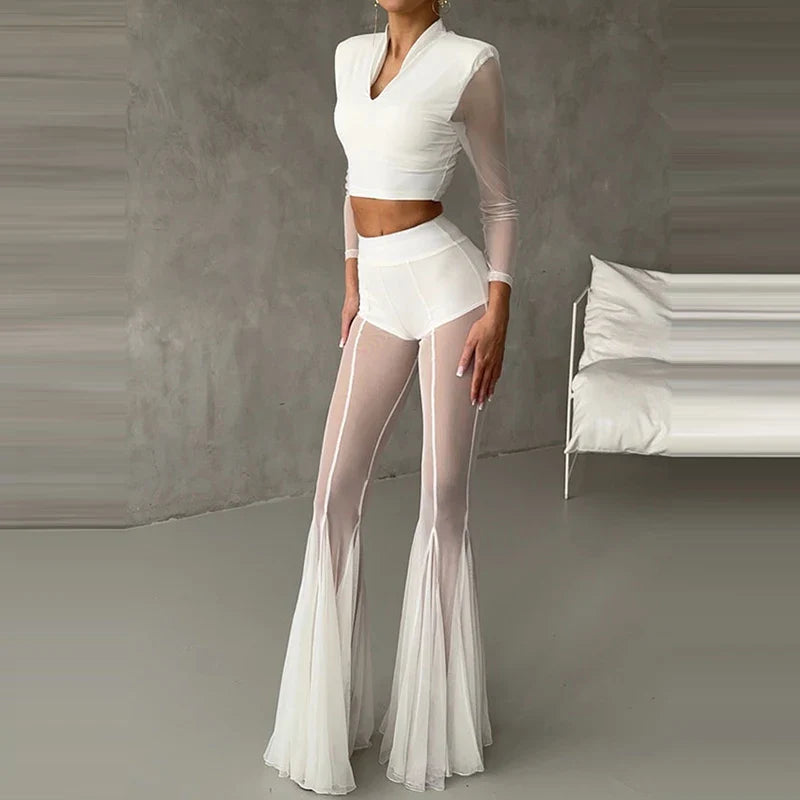 SLIM FLARED PLEATED TROUSERS