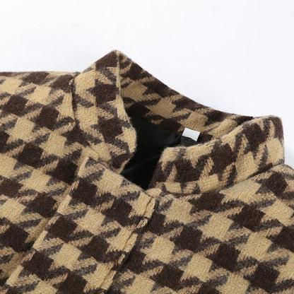 Houndstooth patterned fabric on a white background