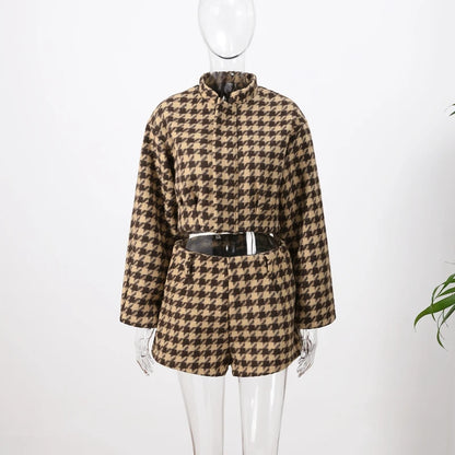 Houndstooth patterned outfit on a mannequin against a white background