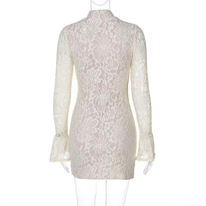 White lace dress on a mannequin against a white background