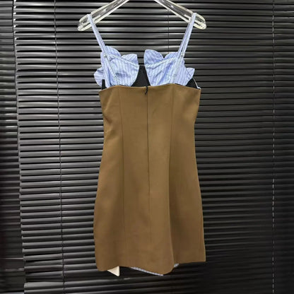 Summer party mini dress with floral bodice and high waist skirt – model side pose.