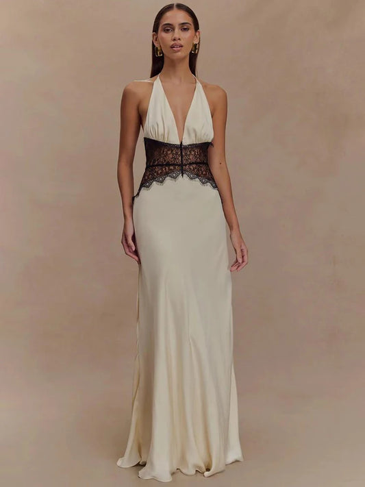 Elegant sleeveless maxi dress with deep V-neckline, black lace waist detail, backless design and flowing hem in white color – summer evening gown