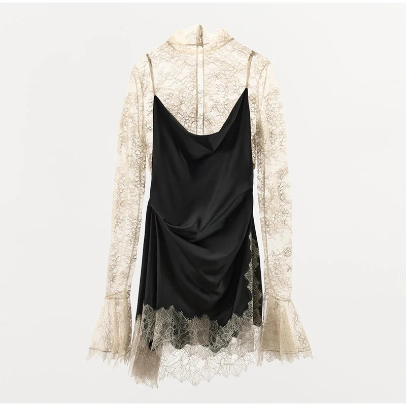 Black dress with lace overlay on a white background
