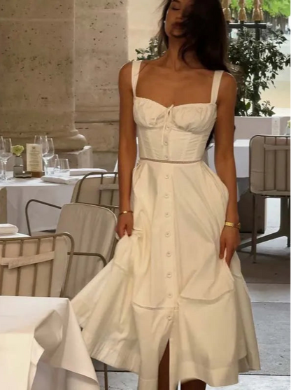White cotton corset midi dress with lace-up back and front button details