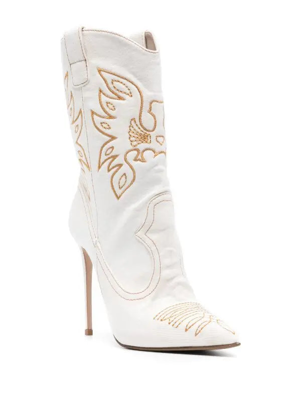 White cowboy boot with gold embroidery on a white background